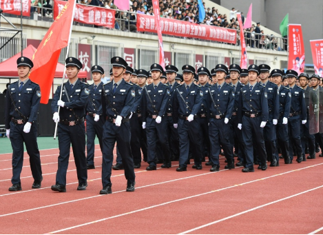 公司驻北大学保安队在学校运动会开幕式展风采